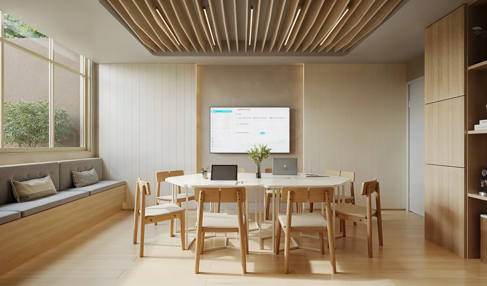 Coworking com mesa grande, cadeiras de madeira e sofá