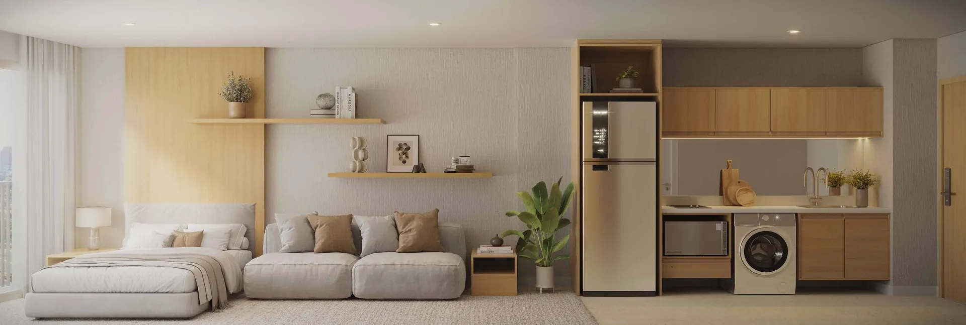 Suíte com cama, sofá, cozinha e lava e seca