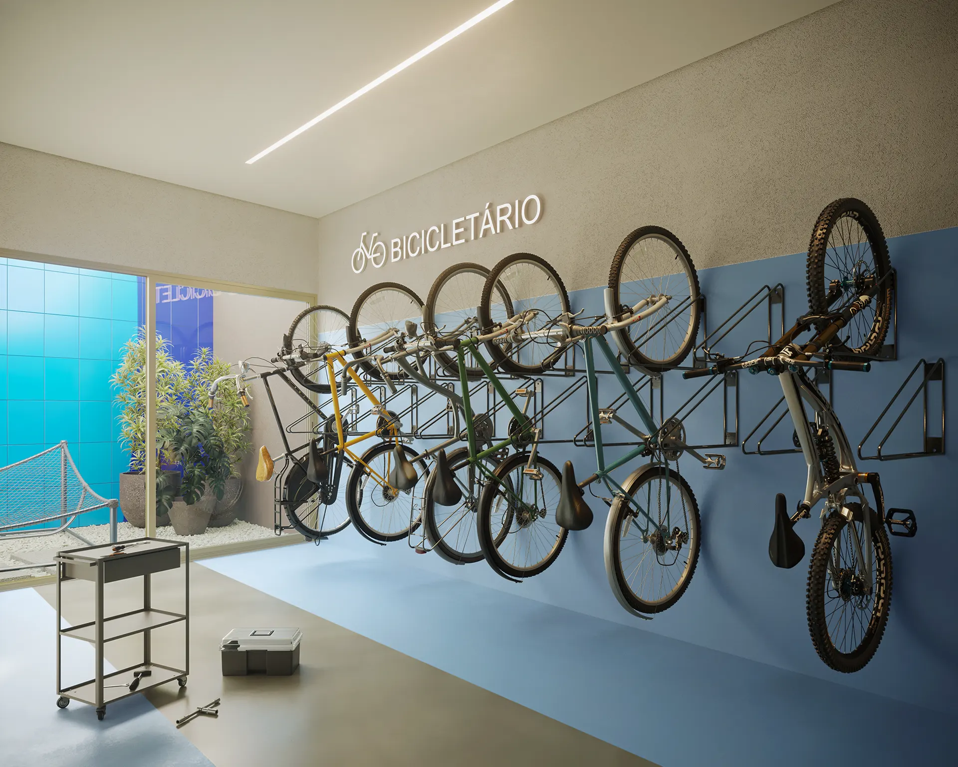 Bicicletário com bicicletas penduradas e parede azul