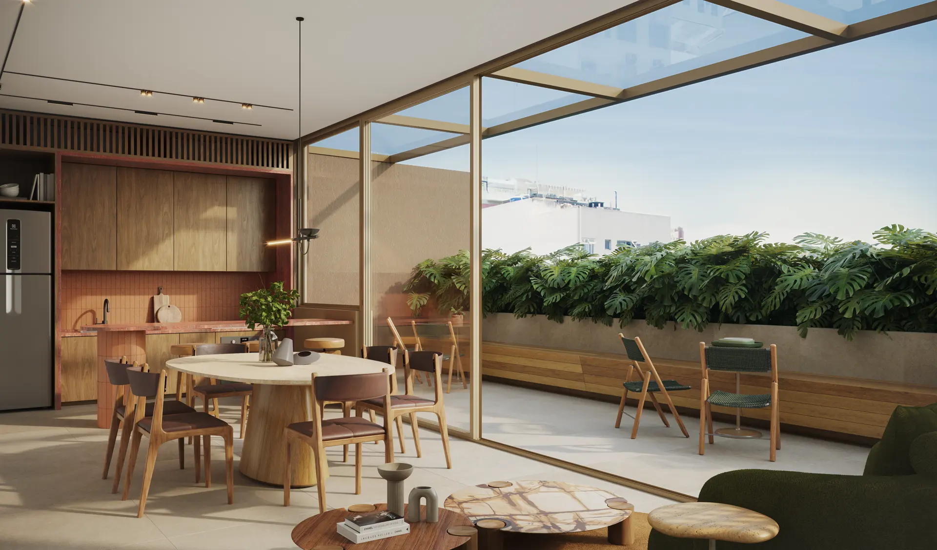 Lounge gourmet com mesa redonda e cozinha aberta para o terraço